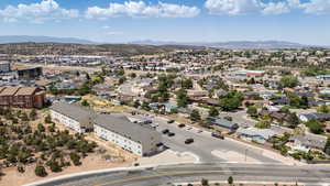 Aerial view of residential area featuring mountains