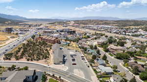 Bird's eye view of a major roadway and a mountainous background