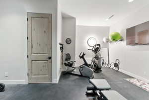 Exercise room featuring baseboards