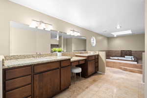 Primary Suite with double vanity and separate tub and shower