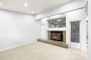 Living Room or Office with vaulted ceiling and fireplace