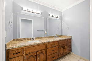 Full bathroom with double vanity area and separate toilet/tub & shower room