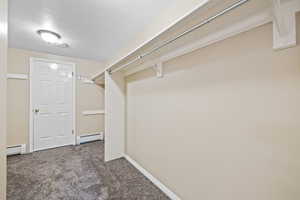 Walk-in Primary Closet with additional storage closet