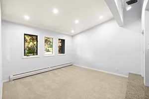 Living Room or Office with vaulted ceiling and fireplace