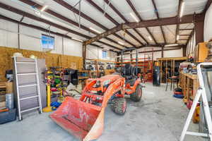 Garage featuring a workshop area