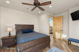 Bedroom featuring recessed lighting, wood finished floors, and ceiling fan