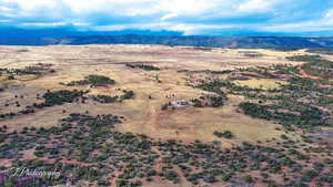 Aerial view of sparsely populated area with mountains
