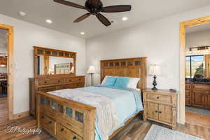 Bedroom with recessed lighting, dark wood-type flooring, and ceiling fan