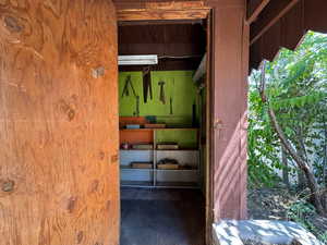 Workshop at rear of carport