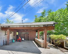 Carport and attached workshop, back of home