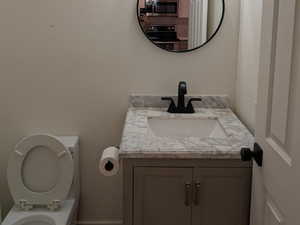 Bathroom featuring vanity and a textured ceiling