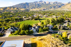 Aerial view of residential area with a mountain backdrop