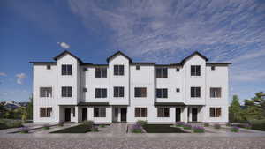 View of front of house featuring board and batten siding