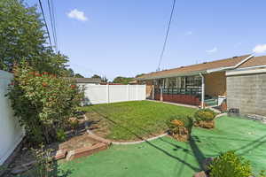 View of fenced backyard