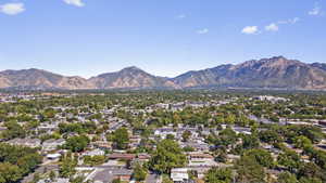 Aerial view of residential area featuring mountains