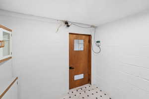 Concrete block wall and light floors
