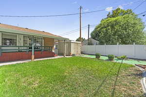View of fenced backyard