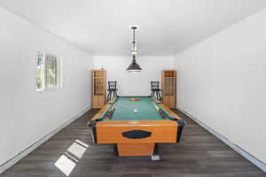 Playroom featuring pool table and dark wood finished floors