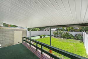View of fenced backyard