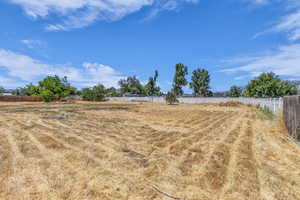View of yard with a view of countryside