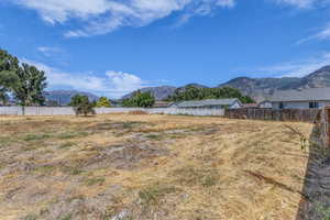 View of yard featuring a mountain view