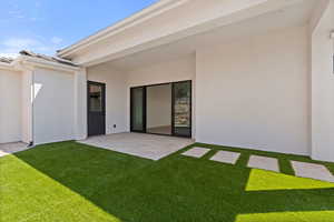 Full landscaping. Maintenance free astroturf