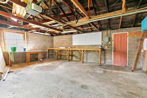 Garage featuring a garage door opener