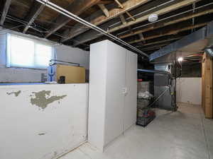 Below grade area with heating unit