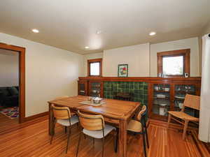 Dining room featuring light wood-style floors and recessed lighting