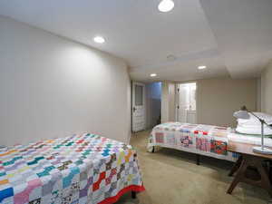 Bedroom featuring recessed lighting and light colored carpet