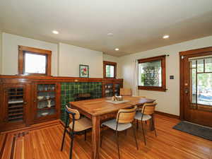 Dining room featuring light wood finished floors and recessed lighting