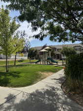 View of home's community featuring a play ground