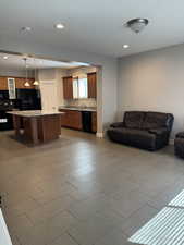Living area connected with kitchen.