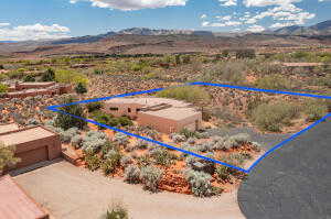 Aerial overview of property's location featuring property boundaries highlighted and mountains