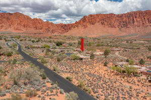 View of mountain backdrop featuring rural landscape