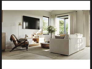 Living area featuring light wood-style floors