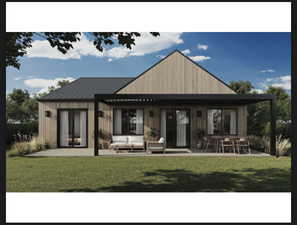 Back of property featuring a patio, a yard, and outdoor lounge area