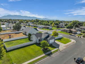 Aerial view of residential area with a mountainous background