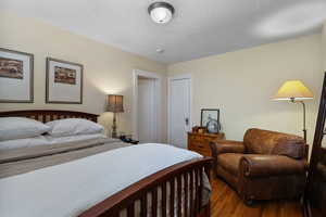 Bedroom featuring wood finished floors
