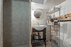 Full bathroom with a sink