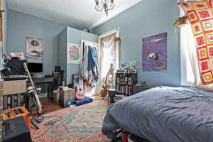 Bedroom with wood finished floors