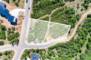 Aerial overview of property's location featuring property parcel outlined