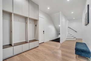 Mudroom featuring recessed lighting and light wood-type flooring