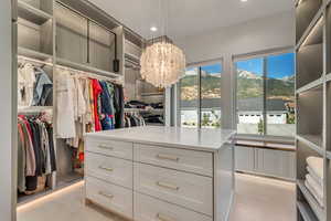 Spacious closet with a chandelier