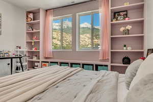 Bedroom featuring a mountain view