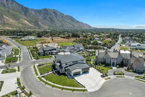 Aerial perspective of suburban area with a mountain backdrop