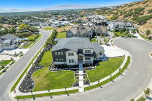 Aerial view of residential area featuring mountains