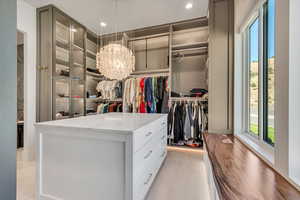 Spacious closet with a chandelier