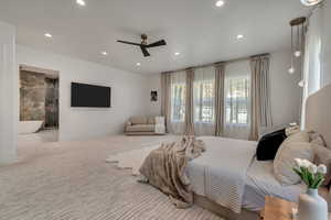 Bedroom with ceiling fan, carpet floors, recessed lighting, and ensuite bathroom