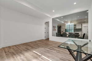 Unfurnished dining area featuring recessed lighting and light wood-style floors